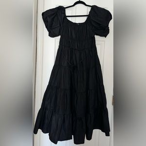 Black off the shoulder maxi dress. Never worn in perfect condition.